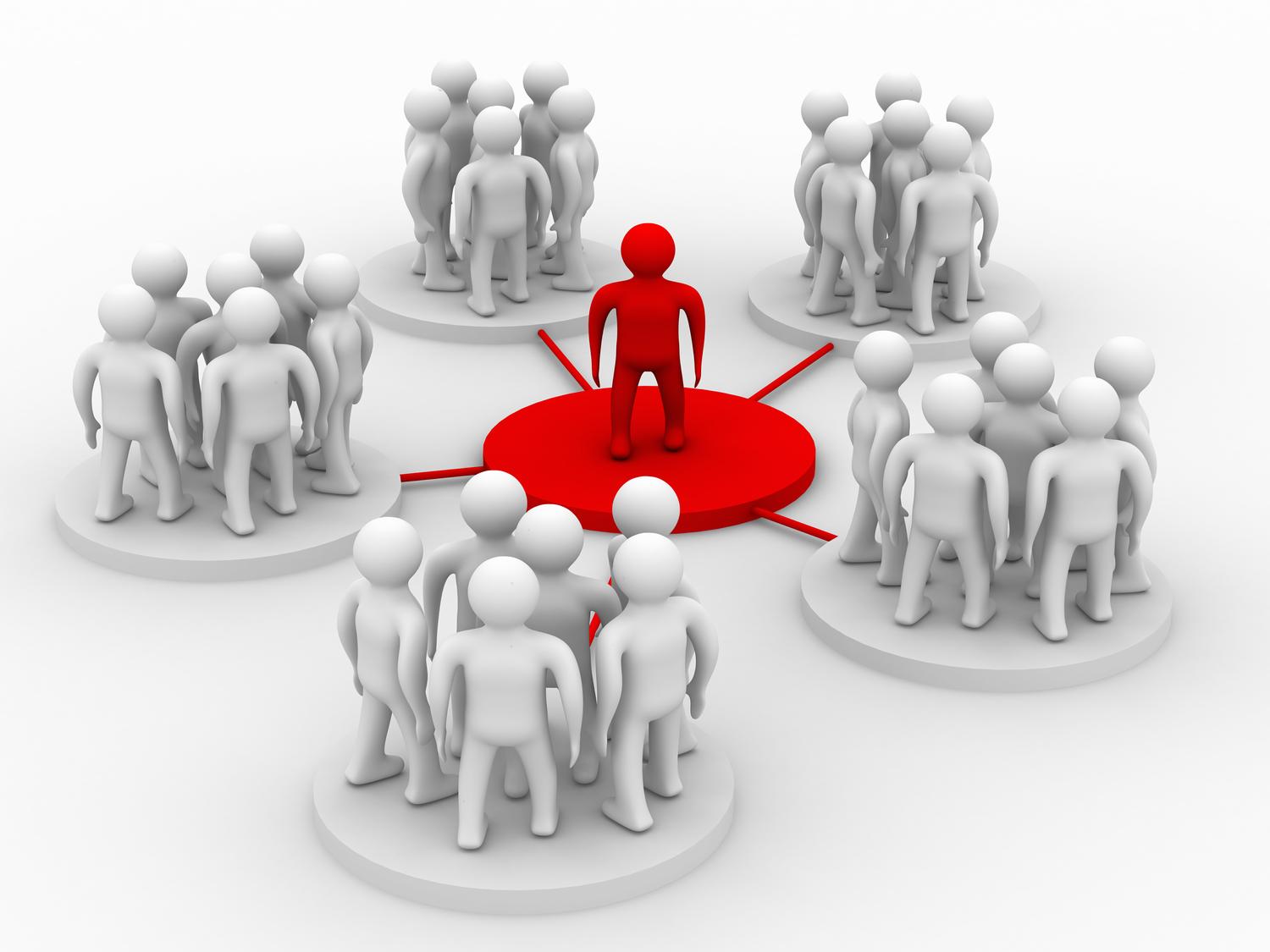 Leader standing surrounded by circles of leadership teams